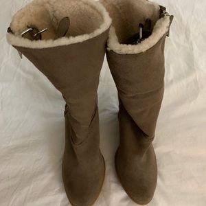 Knee length boot from Coach . Size 8 .